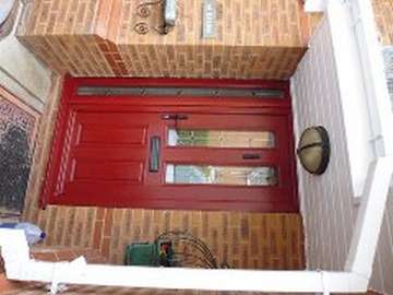 PARKGATE , WIRRAL : Installation of a double diamond Apeer composite door coated in a bespoked RAL colour of the clients choice. Apeer composite doors come tripple glazed with 44mm units as standard with a double rebate seal. 